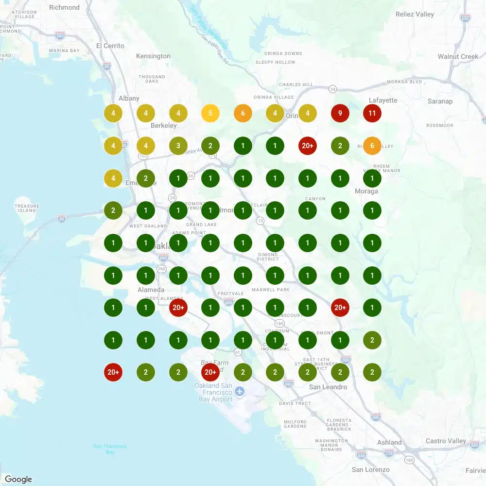 Local Falcon grid scan for Rhino Builders showing mostly first-place pins across Oakland.